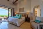 Master Bedroom with king size bed, en suite bathroom, easy access to pool, private terrace